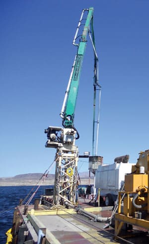Step 4: A 38-meter Putzmeister placing boom places the concrete into a tremie pipe that sends the concrete 390 ft underwater.