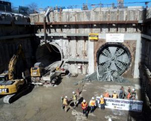 Crews celebrate the latest breakthrough.